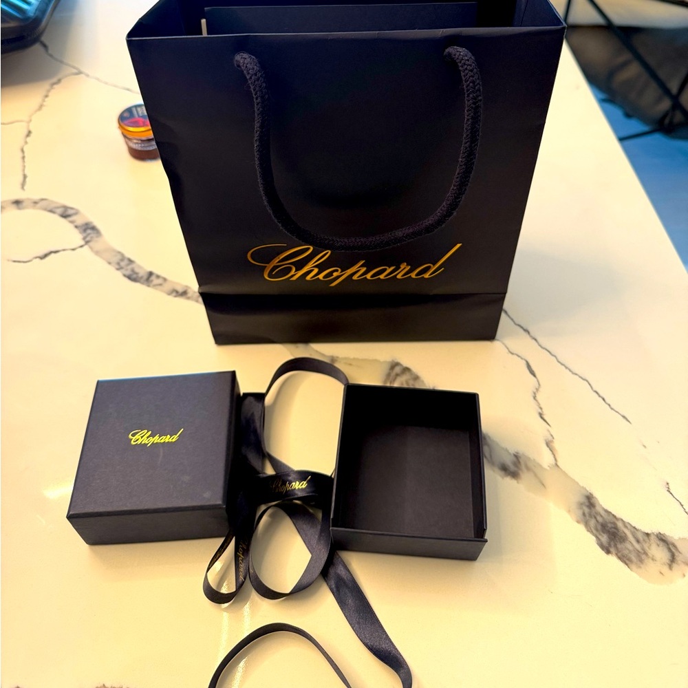 Chopard gift bag and a small outer box